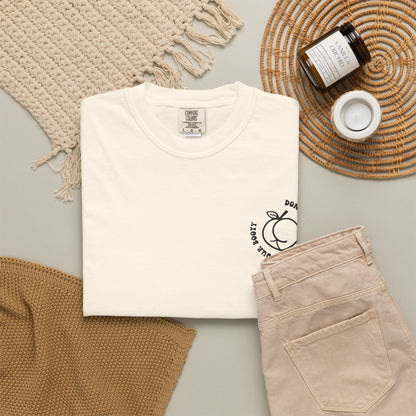 Don't Be Moody Grow Ya Booty T-Shirt | Funny Retro Script, Chest Peach Logo I