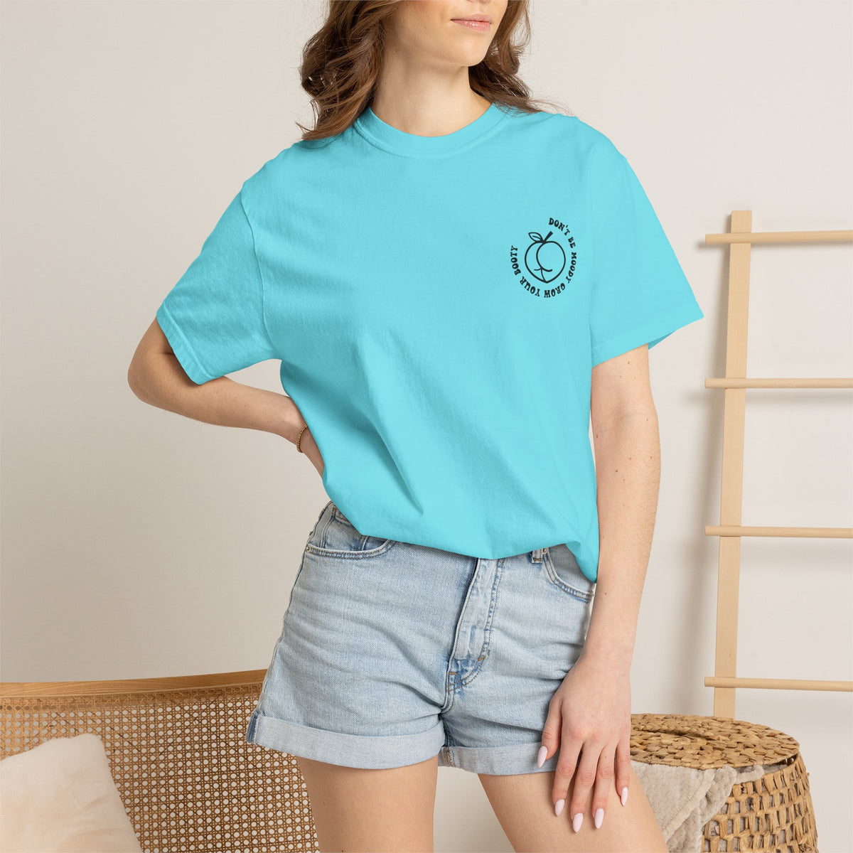Don't Be Moody Grow Ya Booty T-Shirt | Funny Retro Script, Chest Peach Logo I