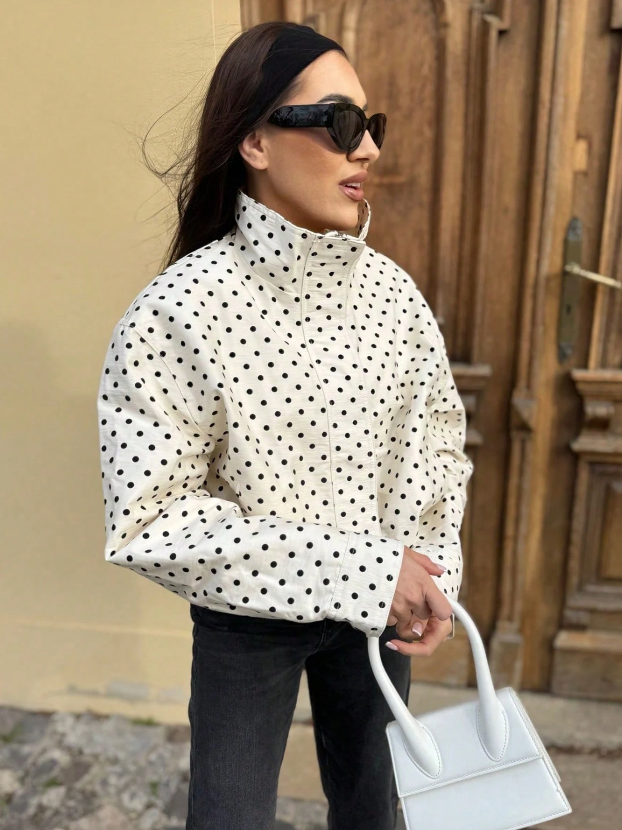 Activewear Model Posing in polka dot jacket