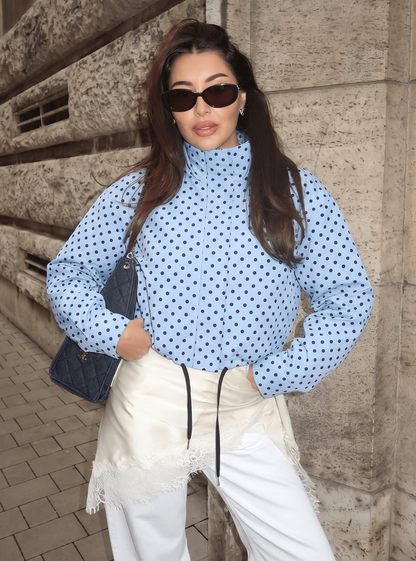Activewear Model Posing in polka dot jacket