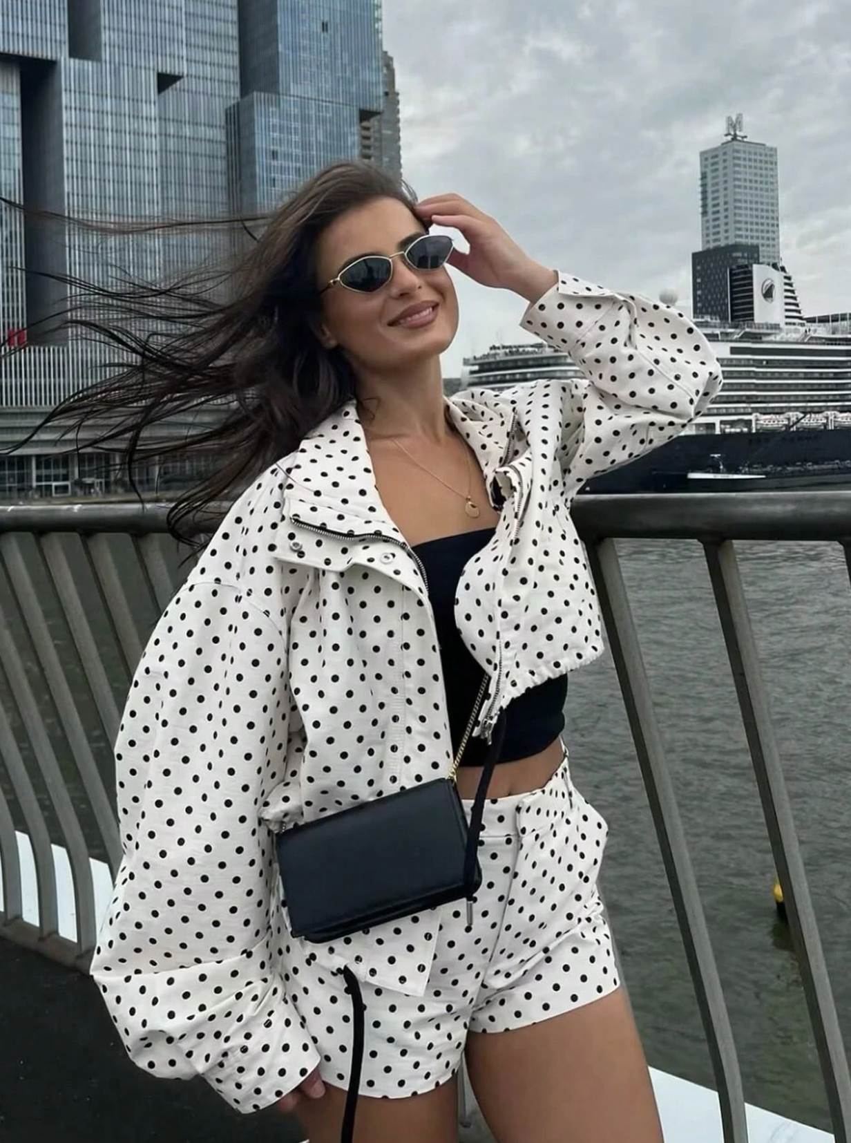 Activewear Model Posing in polka dot jacket
