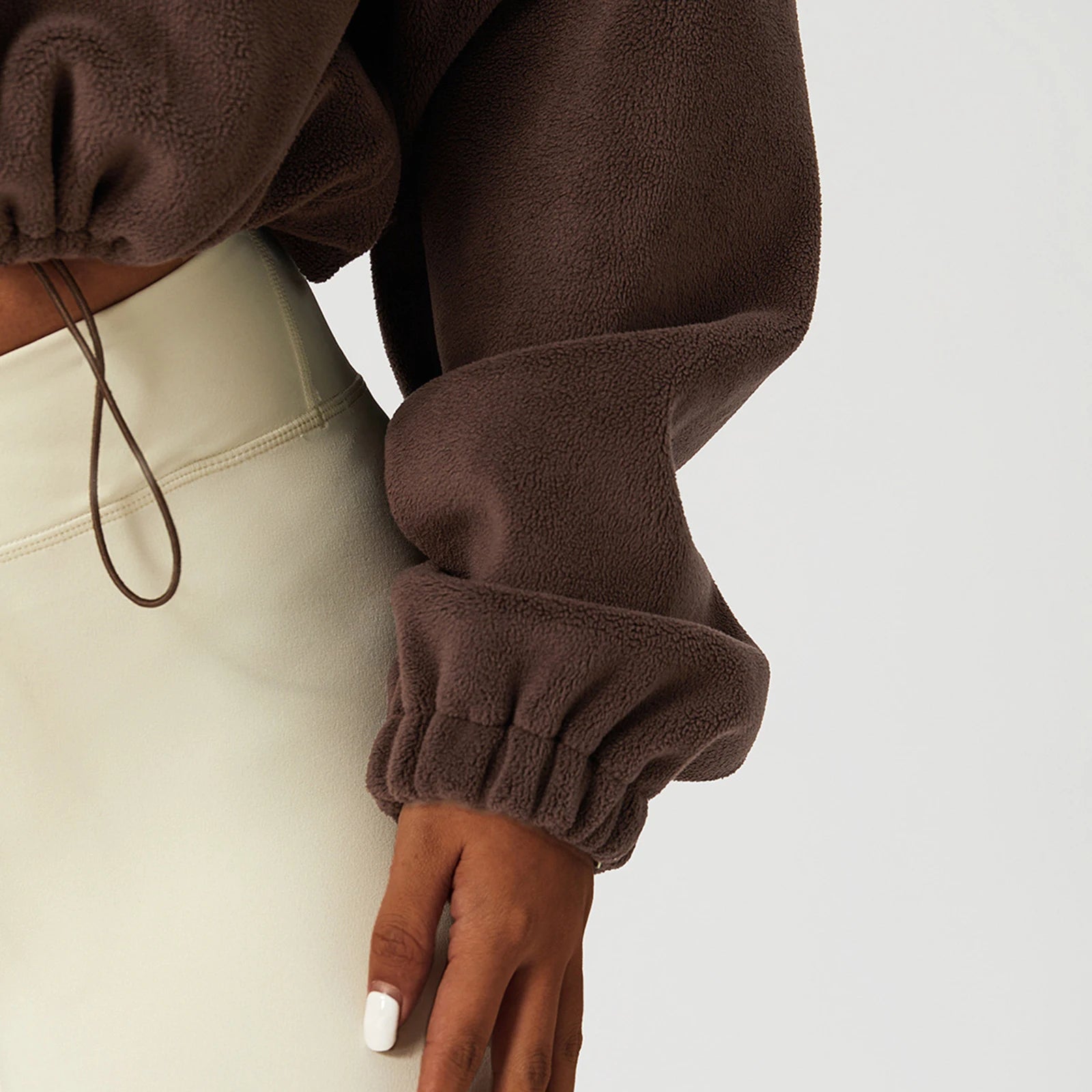 Close-up of sherpa interior and detail on crop jacket