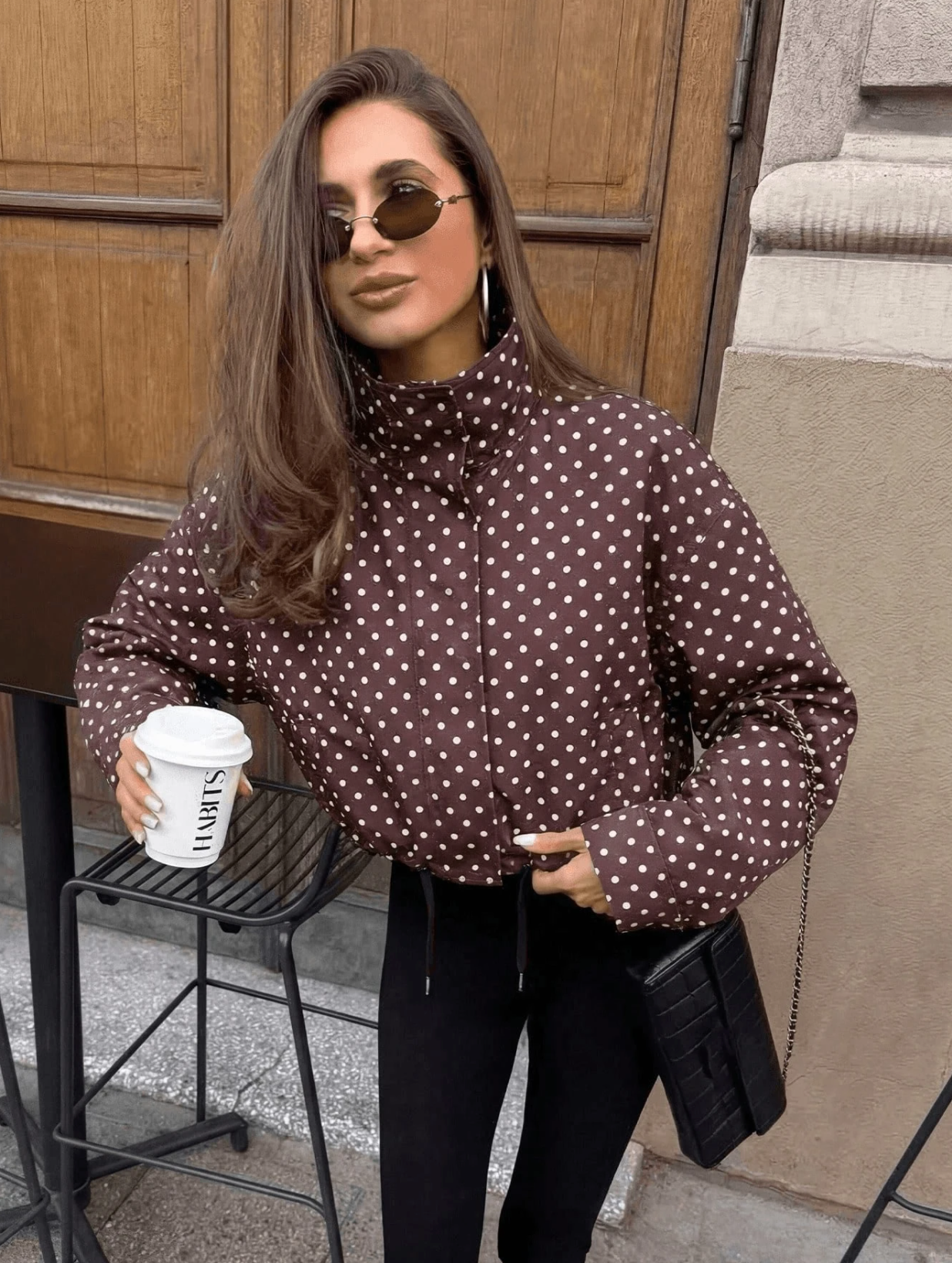 Activewear Model Posing in polka dot jacket