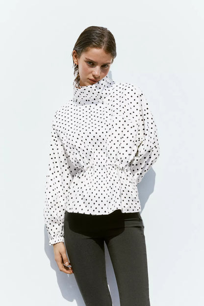 Activewear Model Posing in polka dot jacket