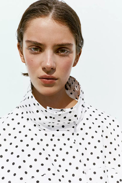 Activewear Model Posing in polka dot jacket